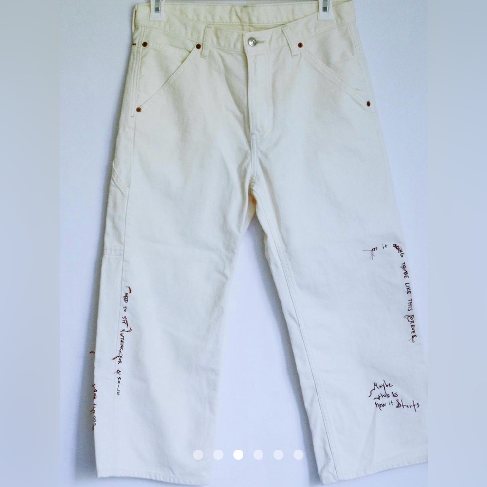 Cream Pants with Text Embroidery